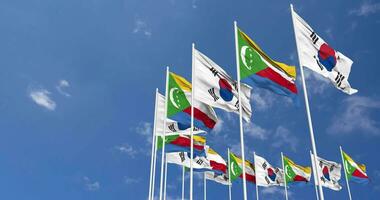 Comoros and South Korea Flags Waving Together in the Sky, Seamless Loop in Wind, Space on Left Side for Design or Information, 3D Rendering video