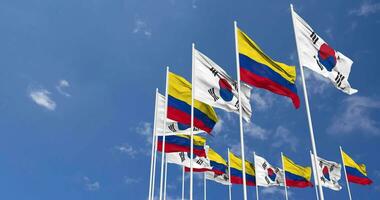 Colombia and South Korea Flags Waving Together in the Sky, Seamless Loop in Wind, Space on Left Side for Design or Information, 3D Rendering video