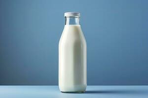 AI generated A glass bottle with full milk on blue background. AI Generated photo