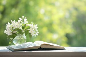AI generated Jasmine flowers in a vase and open book on the table, green natural background. AI Generated photo