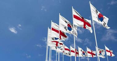 England and South Korea Flags Waving Together in the Sky, Seamless Loop in Wind, Space on Left Side for Design or Information, 3D Rendering video