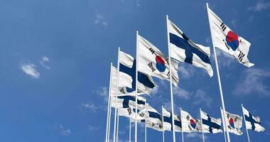 Finland and South Korea Flags Waving Together in the Sky, Seamless Loop in Wind, Space on Left Side for Design or Information, 3D Rendering video