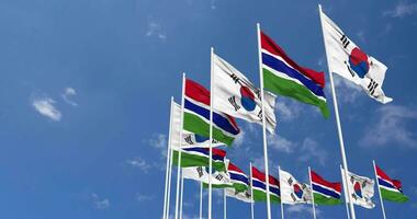 Gambia and South Korea Flags Waving Together in the Sky, Seamless Loop in Wind, Space on Left Side for Design or Information, 3D Rendering video