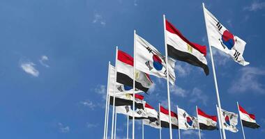 Egypt and South Korea Flags Waving Together in the Sky, Seamless Loop in Wind, Space on Left Side for Design or Information, 3D Rendering video