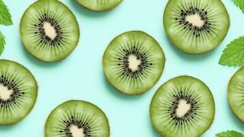 ai generado rebanadas de kiwi Fruta y verde menta hojas en un ligero pastel azul antecedentes. ai generado foto