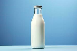 AI generated A glass bottle with full milk on blue background. AI Generated photo