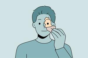 Man tears off fragment of own face to change shell and get rid of psychological problems vector