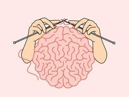 Human brain and hands with knitting needles, as metaphor for intellectual development vector