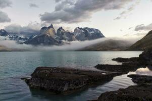 Sunrise over Cuernos del Paine, Torres del Paine National Park and Lake Pehoe, Chilean Patagonia, Chile photo