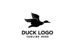 vector logo of a duck in flight in silhouette style