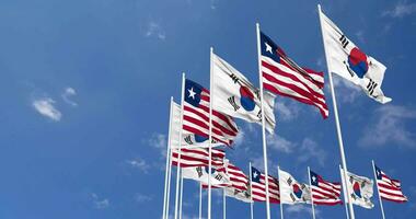 Liberia and South Korea Flags Waving Together in the Sky, Seamless Loop in Wind, Space on Left Side for Design or Information, 3D Rendering video