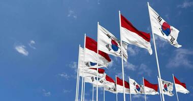 Monaco and South Korea Flags Waving Together in the Sky, Seamless Loop in Wind, Space on Left Side for Design or Information, 3D Rendering video