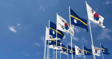 Nauru and South Korea Flags Waving Together in the Sky, Seamless Loop in Wind, Space on Left Side for Design or Information, 3D Rendering video