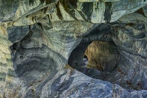 Marble Caves Sanctuary, Strange rock formations caused by water erosion, General Carrera Lake, Puerto Rio Tranquilo, Aysen Region, Patagonia, Chile photo