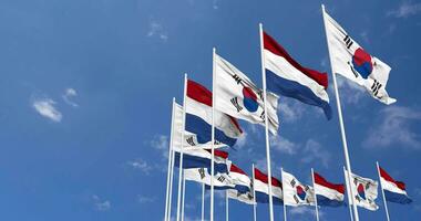 Netherlands and South Korea Flags Waving Together in the Sky, Seamless Loop in Wind, Space on Left Side for Design or Information, 3D Rendering video