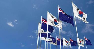 Novo zelândia e sul Coréia bandeiras acenando juntos dentro a céu, desatado ciclo dentro vento, espaço em esquerda lado para Projeto ou Informação, 3d Renderização video