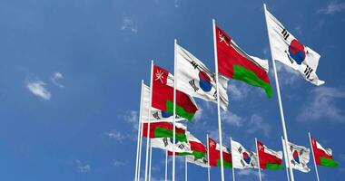 Oman and South Korea Flags Waving Together in the Sky, Seamless Loop in Wind, Space on Left Side for Design or Information, 3D Rendering video