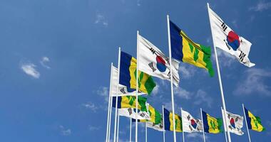 Saint Vincent and the Grenadines and South Korea Flags Waving Together in the Sky, Seamless Loop in Wind, Space on Left Side for Design or Information, 3D Rendering video