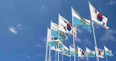 san marino och söder korea flaggor vinka tillsammans i de himmel, sömlös slinga i vind, Plats på vänster sida för design eller information, 3d tolkning video