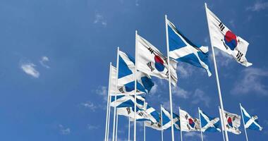 Scotland and South Korea Flags Waving Together in the Sky, Seamless Loop in Wind, Space on Left Side for Design or Information, 3D Rendering video