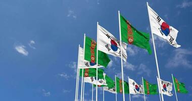 Turkmenistan and South Korea Flags Waving Together in the Sky, Seamless Loop in Wind, Space on Left Side for Design or Information, 3D Rendering video