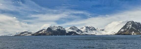 Snow covered mountains, Prion Island, South Georgia, South Georgia and the Sandwich Islands, Antarctica photo