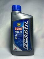 Surakarta, Indonesia, 2023 - Ecstar 4T motor oil, engine oil 800ML. Suzuki. Plastic bottle for engine oil. photo