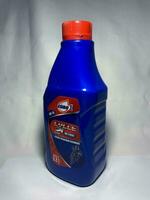 Surakarta, Indonesia, 2023 - Euro 1 motor oil for 2T, strength for maximum performance motorcycle 800ml. Plastic bottle for engine oil. photo