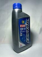 Surakarta, Indonesia, 2023 - Ecstar 4T motor oil, engine oil 800ML. Suzuki. Plastic bottle for engine oil. photo