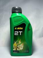 Surakarta, Indonesia, 2023 - Evalube Pro 2T motor oil, synthetic api tc for 2T motorcycle 700ml. Plastic bottle for engine oil. photo