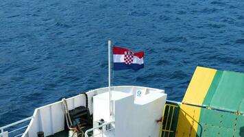 Croatian flag on the ferry. Travel to Croatia. Boat as a means of transportation. video