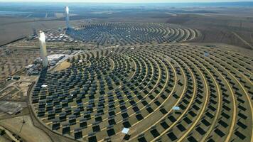 Aerial view of the Solar Power Towers PS10 and PS20 in Sanlucar la Mayor, Seville. Spain's stunning solar energy plant.  Concentrated solar power plant. Renewable energy. Green energy. video