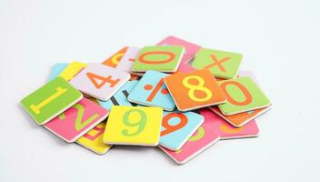 Number wood block cubes for learning Mathematic, education math concept. photo