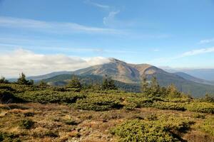 Mount Hoverla hanging peak of the Ukrainian Carpathians against the background of the sky photo