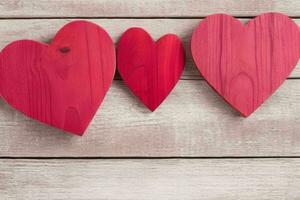 AI generated Wooden background with red heart, candle, gifts. Valentines Day. Mothers Day anniversary. Pro Photo