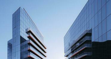 AI generated Two modern buildings with glass windows. Architecture design of buildings.  AI Generated photo