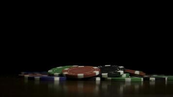 Falling poker chips isolated on black background. Colorful poker chips falling at the table on black background. Playing chips flying at the black background photo