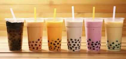 AI generated Plastic cups of different tasty bubble tea on wooden background. Generative AI photo