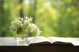 AI generated Jasmine flowers in a vase and open book on the table, green natural background. AI Generated photo