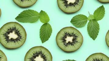 AI generated Slices of kiwi fruit and green mint leaves on a light pastel blue background. AI Generated photo