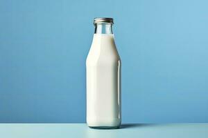 AI generated A glass bottle with full milk on blue background. AI Generated photo