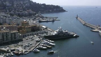 Aerial view of luxury yachts near the coastline. Action. The popular destination of Villefranche-sur-Mer, near Nice, on the French Riviera. photo