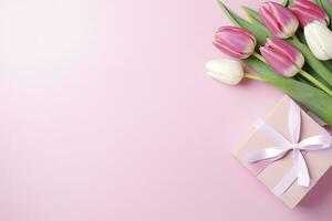 AI generated Mother's Day concept. Pink gift box with ribbon bow and a bouquet of tulips.  AI Generated photo