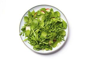 AI generated Healthy fresh green salad plate shot from above on white background. AI Generated photo