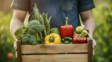 AI generated Farmer man holding wooden box full of fresh raw vegetables. AI Generated photo