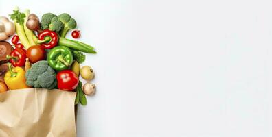 AI generated Healthy food in paper bag vegetables and fruits on white background. AI Generated photo