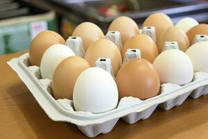 AI generated Close up of open carton of fresh store bought white eggs. AI Generated photo