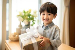 AI generated Cute asian little boy holding a gift box photo