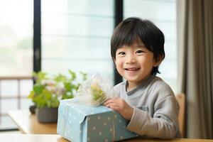 AI generated Cute asian little boy holding a gift box photo