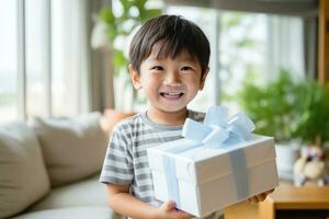 AI generated Cute asian little boy holding a gift box photo